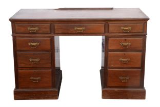 Edwardian mahogany pedestal dressing table, the central drawer and kneehole enclosed by eight