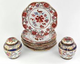 Eight famille rose dishes; each one decorated with floral designs and about 22.5 cm diameter