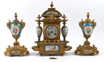 French gilt metal and Sevres style porcelain clock garniture, 19th Century, the clock with