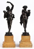 Pair of bronze figures of Bacchanals, 19th Century, she holding a cymbal and wearing a pelt,