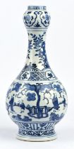 A blue and white vase, decorated with scholars and their attendants in a garden; 37cm high,