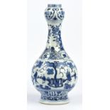 A blue and white vase, decorated with scholars and their attendants in a garden; 37cm high,