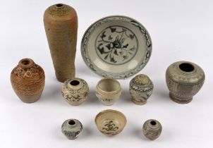 Ten Asian or South East Asian ceramics, comprising: a circular dish, 22 cm diameter; seven various