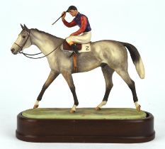 Doris Lindner, a Royal Worcester porcelain model of the Winner, on a wooden stand, 28cm high