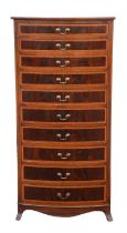 Edwardian mahogany and satinwood banded chest of drawers, of bowfront form and with ten graduated