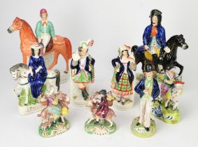A group of Staffordshire figures, to comprise a temperance figure of Gin/Water, 22cm high,