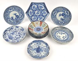 Twelve Arita [or other] sometsuke dishes, some with underglaze blue marks to the base; one dish of