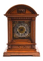 Early 20th century Edwardian mahogany eight day mantel clock with silvered dial, 36cm high Charity