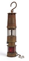 A Spiralalarm miners/sewer safety lamp by J H Taylor of Wigan, 35cm high