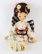 A Lenci type doll, in the form of a Geisha girl, with jointed body, wearing a kimono, 59cm high