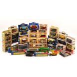 Approximately 40 boxed toy model cars, along with several loose. Including Corgi, Days Gone,
