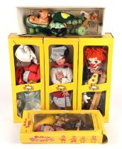 Five boxed Pelham Puppets, to include Bimbo the Clown (SL17), Baby Dragon (A3), Snake Charmer with