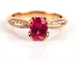 Kat Florence pink tourmaline and diamond ring, with central oval cut pink tourmaline weighing a