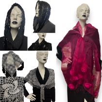 A beaded crocheted triangular ornate silver scarf, a black sequinned snood and a shocking pink fine