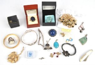 A group of costume jewellery, including two long Swarovski necklaces, a Trifari rose brooch,