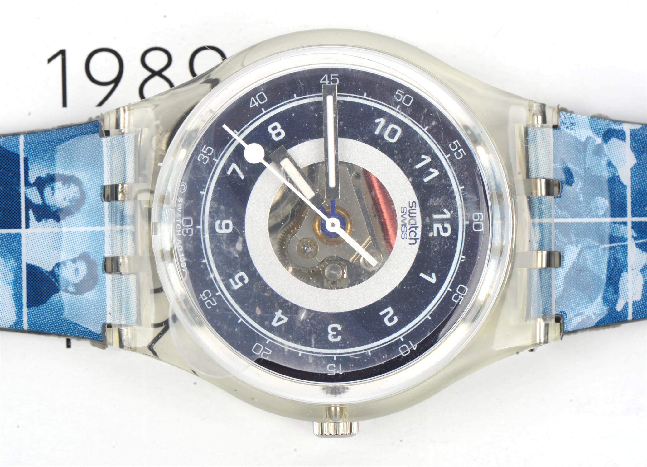 Swatch, a Sky 10th Anniversary wristwatch, blue dial with a window in the centre to reveal the - Image 3 of 3