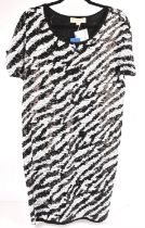 MICHAEL KORS two ladies sequinned party dresses one zebra monochrome and one on-trend gold and