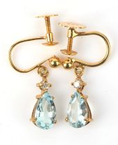 A pair of aquamarine and diamond drop earrings, set with a pear cut aquamarine suspended from a