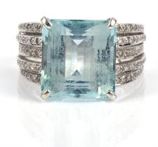 Aquamarine and diamond cocktail ring, central emerald cut aquamarine estimated weight 8.30 carats,