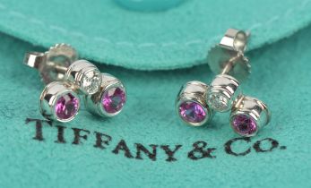 Tiffany pink sapphire and diamond earrings, with two round cut pink sapphires and a round brilliant