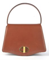 DUNHILL classic tan leather rigid handbag with gold tone twist-lock fastening and fine tan suede