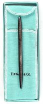 Tiffany & Co sterling silver ball point pen, with engraved pattern, with original box and pouch
