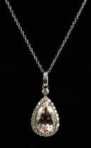 Morganite and diamond pendant, central pear cut morganite weighing an estimated 2.59 carats,