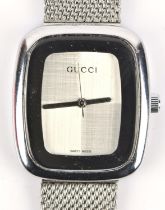 Gucci a Reference 8205L stainless steel wristwatch, with signed dial, silvered hands,