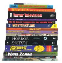 Horror, monsters, zombies and related books - a group of sixteen hardback and softcover books,