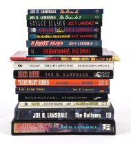 LANSDALE (Joe). A group of nineteen first edition hardback and paperback books, eight of which are