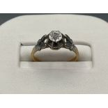 Ladies 9ct gold solitaire diamond ring with white gold shoulders, size I and 2.63g