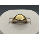 18ct gold signet ring, size M1/2 and 3.11g