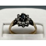 Ladies 9ct gold and silver diamond and sapphire cluster ring, size J1/2 and 1.31g