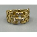 Gents 18ct gold 4 stone diamond set fancy ring, size Q1/2 and 6.18g