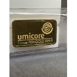 Umicore 1 ounce 999.9 fine gold bar in protective sleeve
