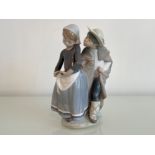 Lladro 1188 ‘Sneaky kiss’ in good condition and original box