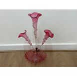 Victorian Cranberry glass epergne, complete with base & three trumpets. Height 43cm