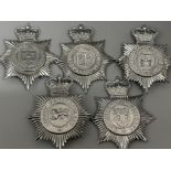 Total of five vintage Police cap/helmet badges including Sussex, Surrey & Cheshire Constabulary