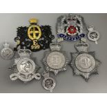 Total of seven vintage police cap/helmet badges, plus a black & gilt reproduction of the Domine