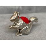 A silver Squirel pincushion, weighing in at 10.9grams