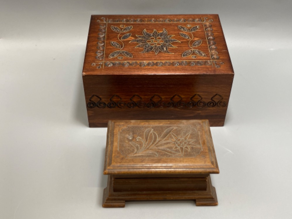 2 nicley carved wooden boxed both with flower designs