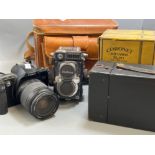 Canon EOS 500 camera, Yashica 44 and coronet box camera