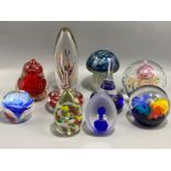 A lot of 10x paper weights all in different colours and sizes (see in image)