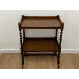 Nice quality two teir barley twist leg oak tea trolley with castors feet circa 1920