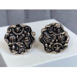 A pair of silver pirate style cufflinks cased, weighing in at 12.16grams