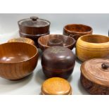 Mixed lot of carved wooden bowls and trinket lidded tubs