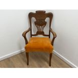 Stunning Oak chair with orange upholstery