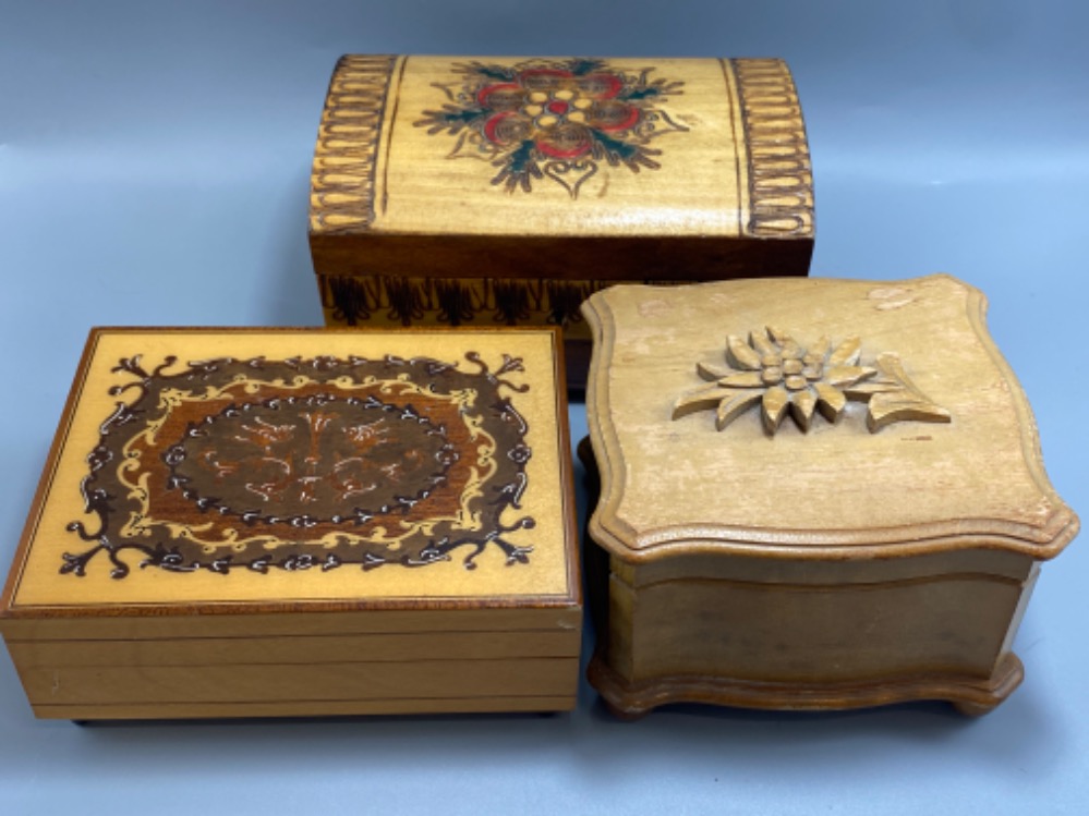 3 nicely carved wooden boxes 2 with musical mechanisms