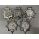 Total of 5 vintage police cap/helmet badges including Lancashire and Wiltshire constabulary, also
