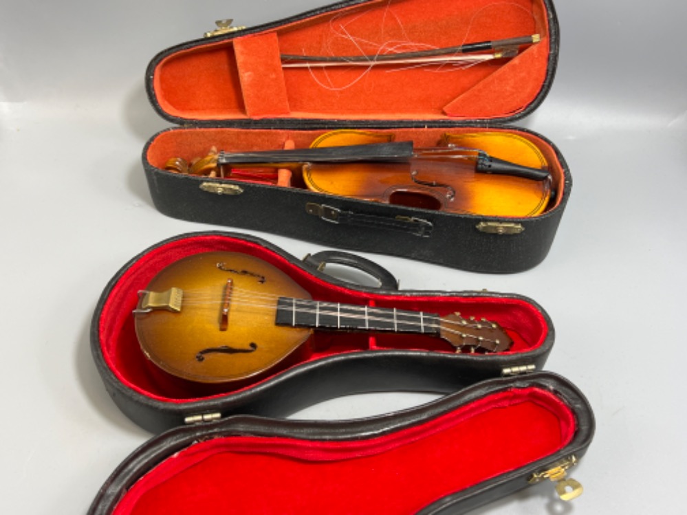 2 miniature cased violin and mandolin